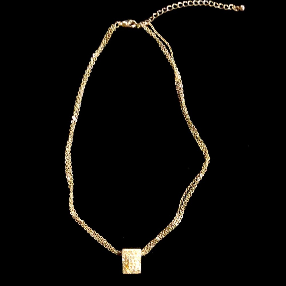 Triple silver tone necklace with rhinestone pendant
